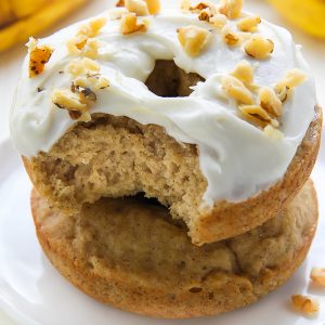 Supremely moist and flavorful banana bread donuts topped with luscious cream cheese frosting! Add a sprinkle of chopped walnuts for a lovely little crunch.