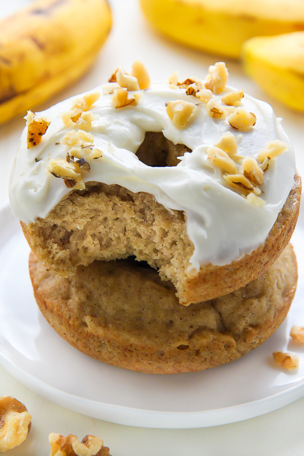 Supremely moist and flavorful banana bread donuts topped with luscious cream cheese frosting! Add a sprinkle of chopped walnuts for a lovely little crunch.