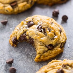 These Vegan Chocolate Chip Cookies are thick, chewy, and loaded with gooey chocolate. No one will guess they're vegan!