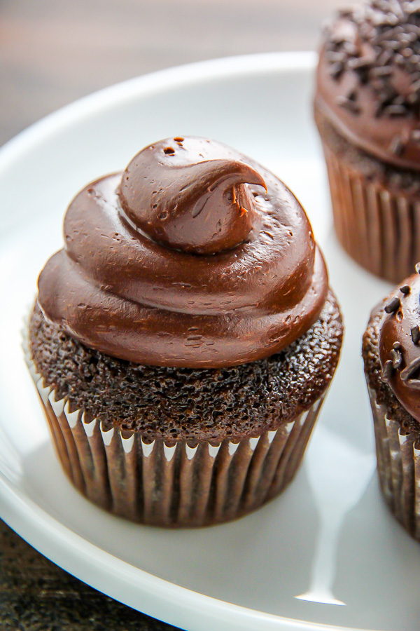 Old-fashioned chocolate buttermilk cupcakes topped with a generous swirl of homemade chocolate frosting. A timeless classic!