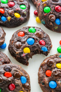 Thick and chewy soft batch chocolate cookies loaded with rainbow M&Ms and gooey chocolate chips!