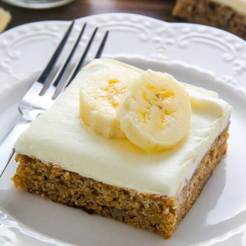Ultra soft Old-fashioned banana bars topped with homemade cream cheese frosting and finished off with fresh banana slices. One of my favorite recipes!