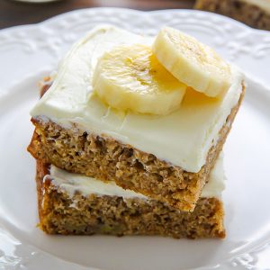 Ultra soft Old-fashioned banana bars topped with homemade cream cheese frosting and finished off with fresh banana slices. One of my favorite recipes!