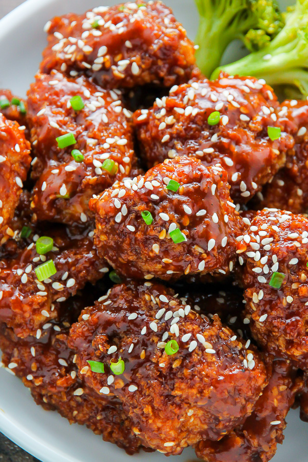 Crispy, saucy, and supremely flavorful Sesame chicken! Oven baked and ready in less than an hour.