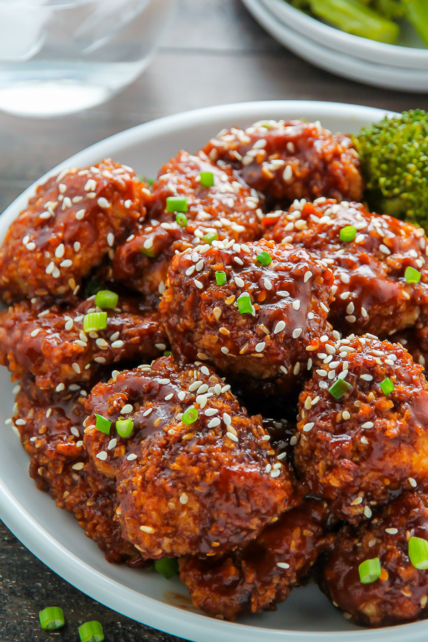 Crispy, saucy, and supremely flavorful Sesame chicken! Oven baked and ready in less than an hour.