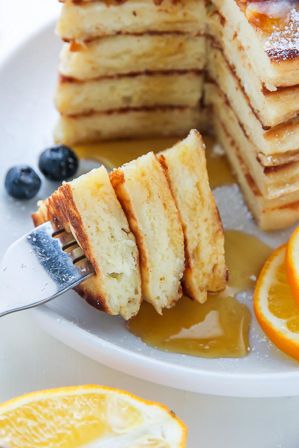 Super soft and fluffy Lemon Ricotta Pancakes made from scratch! Bonus: This recipe is freezer friendly.