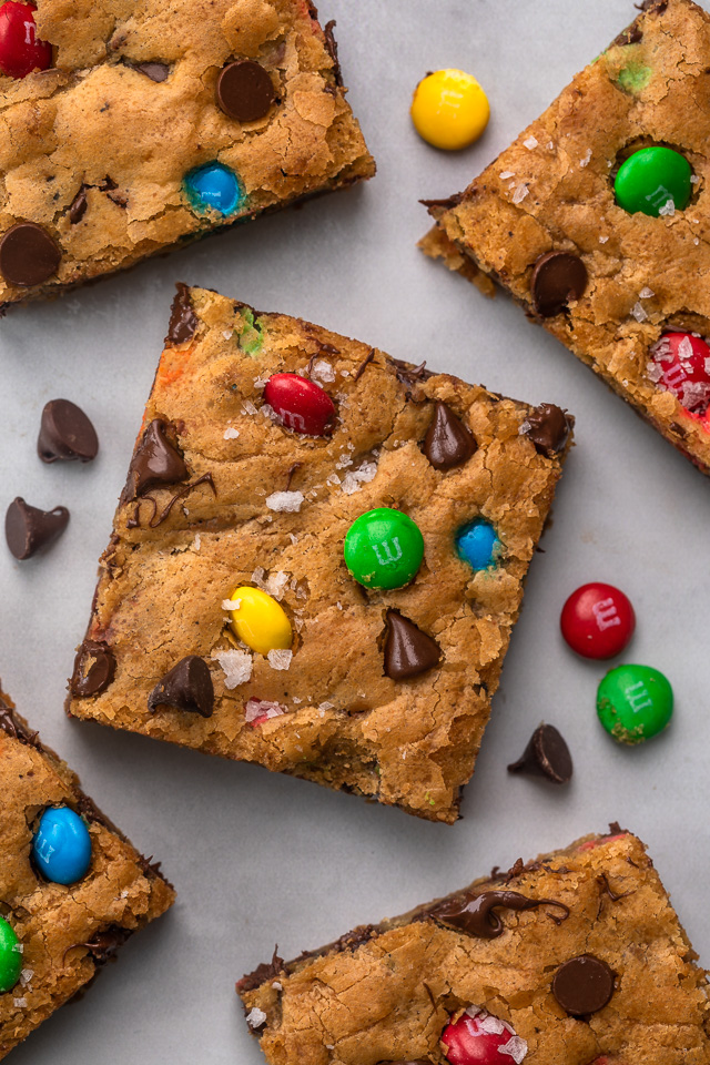 These thick and chewy Brown Butter M&M Blondies are irresistible! An easy cookie bar that's loaded with chocolate chips and M&M candies. Loved by kids and adults, this blondie recipe is always a crowd pleaser! 