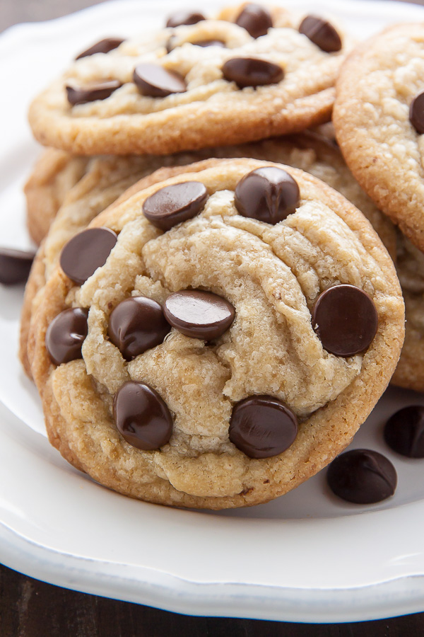 Coconut Oil Chocolate Chip Cookies with soft centers and crispy edges! The best part? No cookie dough chilling required! Just roll and bake.