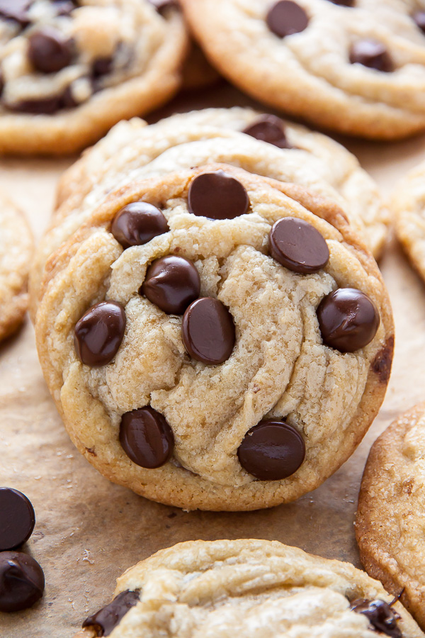 Coconut Oil Chocolate Chip Cookies with soft centers and crispy edges! The best part? No cookie dough chilling required! Just roll and bake.