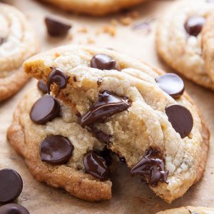Coconut Oil Chocolate Chip Cookies with soft centers and crispy edges! The best part? No cookie dough chilling required! Just roll and bake.