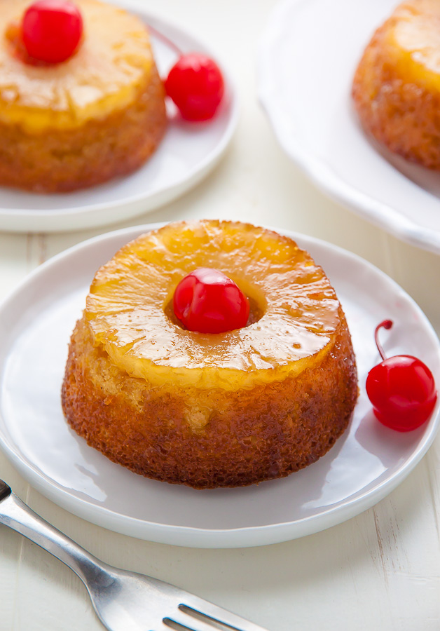 Mini pineapple cakes on plates.