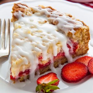 Moist and buttery strawberry crumb cake topped with sweet vanilla glaze!