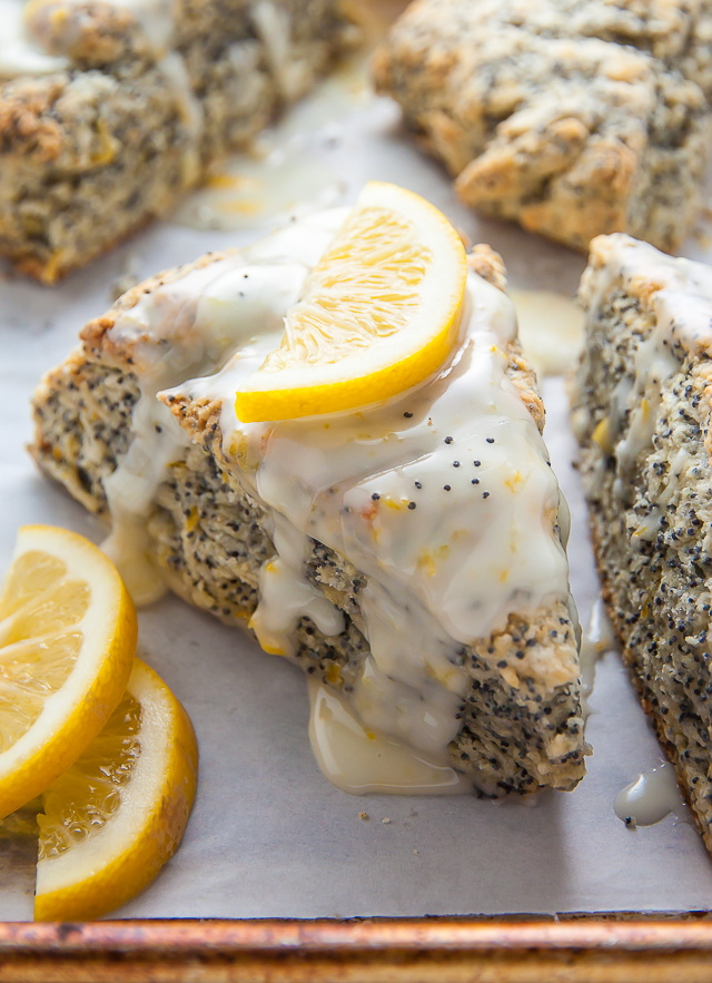 Classic and crumbly Meyer Lemon Poppy Seed Scones. The sunshine sweet lemon glaze makes them irresistible!