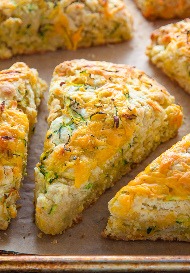 My favorite savory scone recipe loaded with sharp cheddar cheese and fresh zucchini! Who knew veggies could taste this good!?