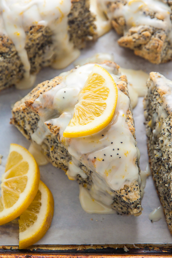 Classic and crumbly Meyer Lemon Poppy Seed Scones. The sunshine sweet lemon glaze makes them irresistible!