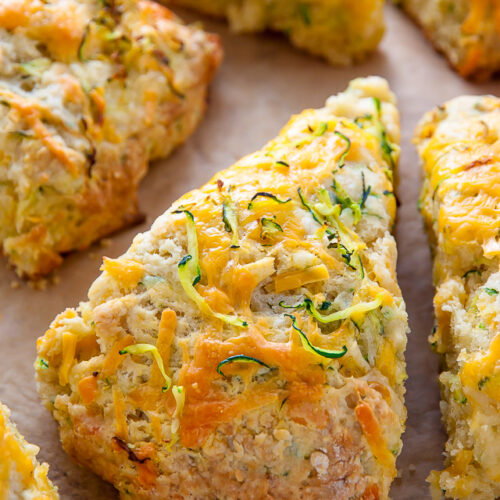 My favorite savory scone recipe loaded with sharp cheddar cheese and fresh zucchini! Who knew veggies could taste this good!?