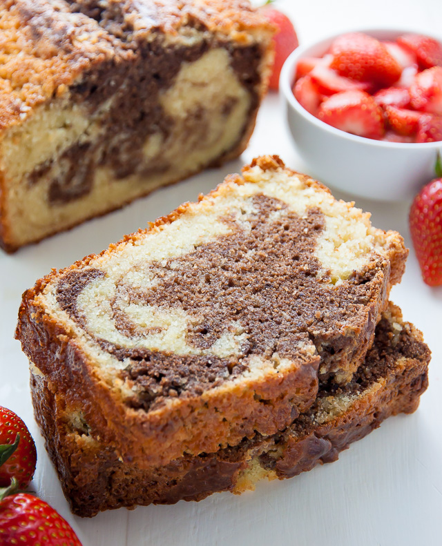 Supremely Moist Marble Pound Cake topped with juicy strawberries! This one's a keeper.