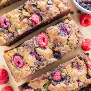 Supremely moist Banana Bread studded with fresh raspberries and chocolate chips. Bonus: It's healthy!