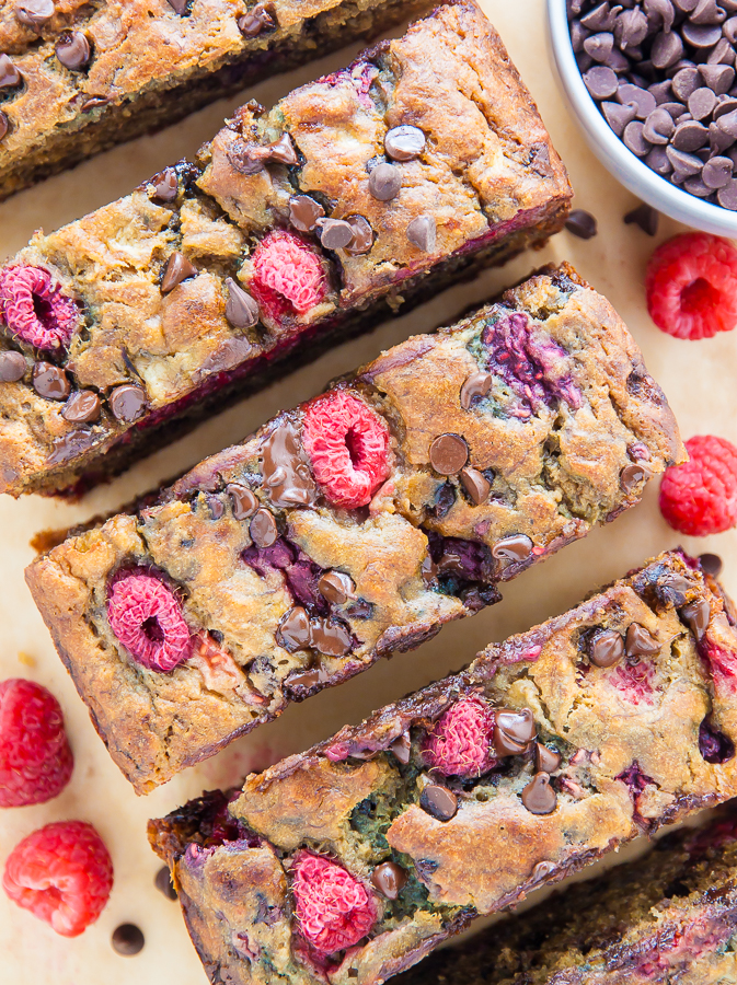 Supremely moist Banana Bread studded with fresh raspberries and chocolate chips. Bonus: It's healthy!