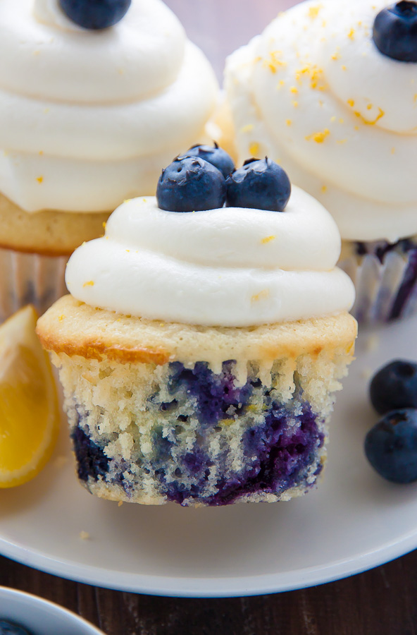 My favorite Lemon Blueberry Cupcakes! Topped with homemade Lemon Cream Cheese Frosting and Fresh Blueberries, they're simply irresistible.