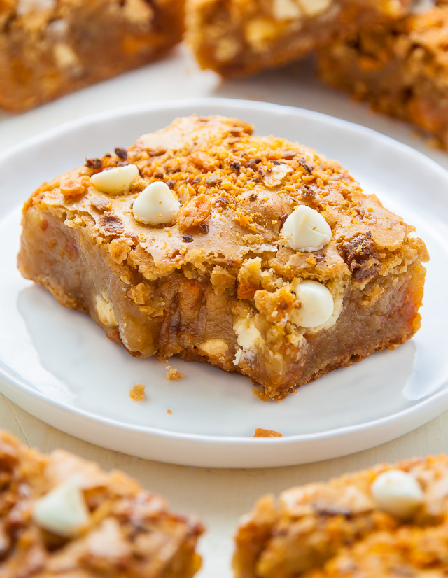 Chewy Butterfinger Blondies loaded with White Chocolate Chips! Easy, delicious, incredible.