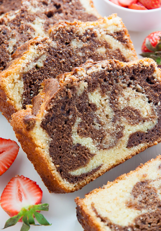 Supremely Moist Marble Pound Cake topped with juicy strawberries! This one's a keeper.