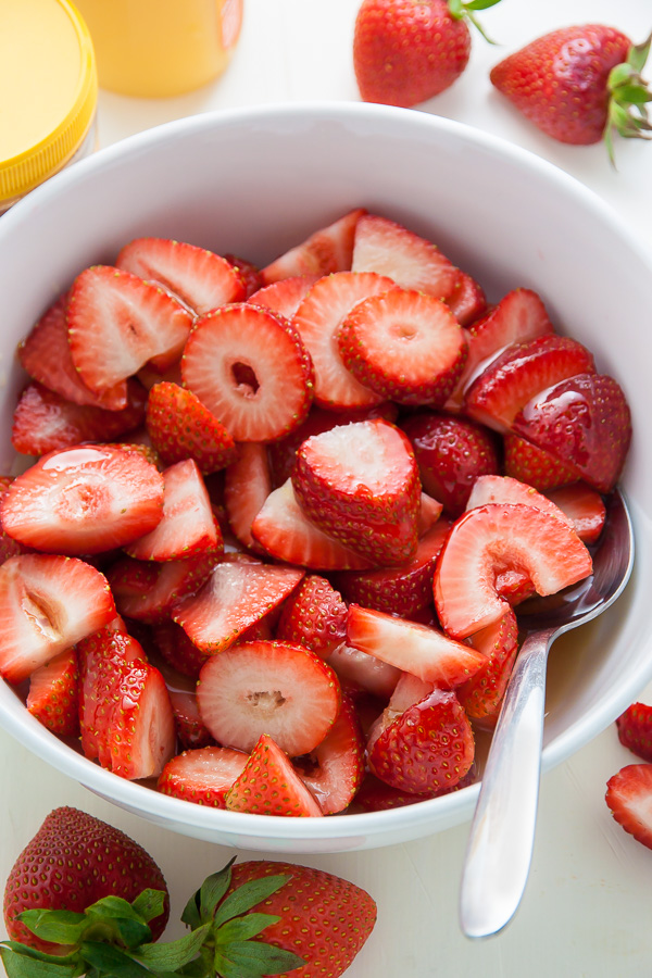 Supremely Moist Marble Pound Cake topped with juicy strawberries! This one's a keeper.