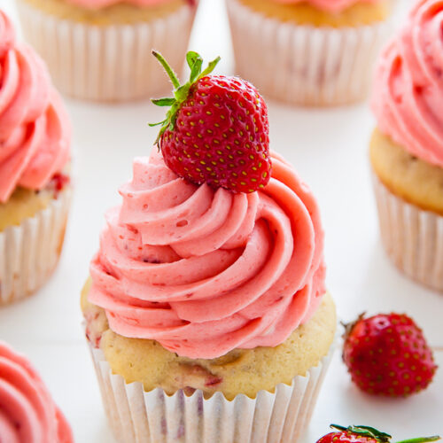 Soft and Fluffy Fresh Strawberry Cupcakes topped with homemade Strawberry Buttercream!