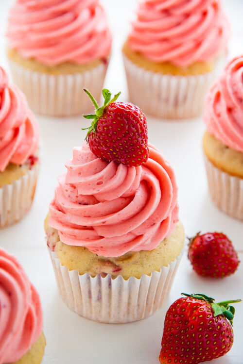 Soft and Fluffy Fresh Strawberry Cupcakes topped with homemade Strawberry Buttercream!
