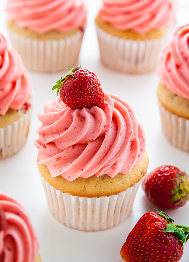 Soft and Fluffy Fresh Strawberry Cupcakes topped with homemade Strawberry Buttercream!