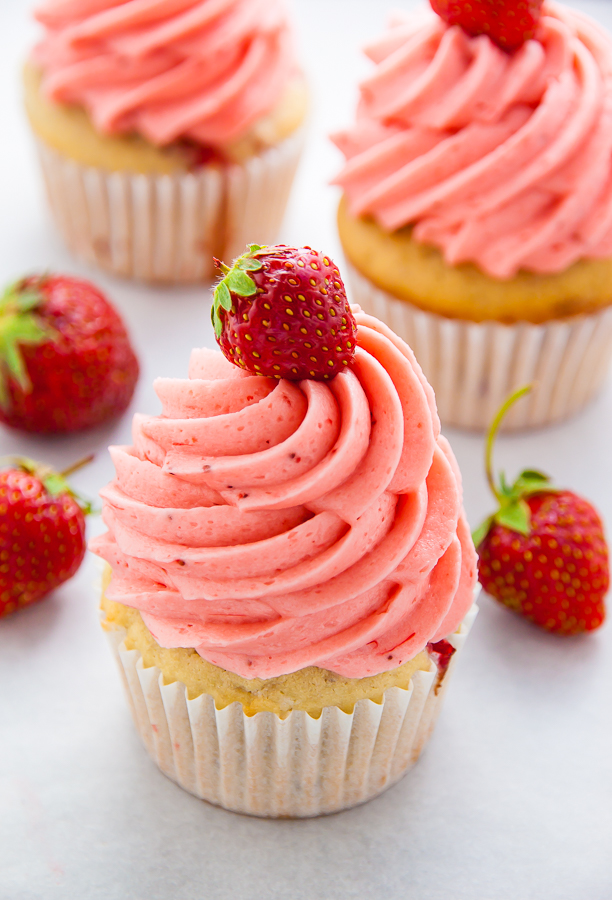 Soft and Fluffy Fresh Strawberry Cupcakes topped with homemade Strawberry Buttercream!