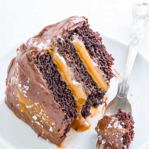 Three layers of Salted Caramel Chocolate Cake slathered in homemade Salted Caramel Chocolate Frosting. So decadent!