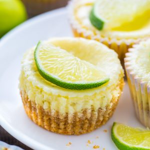 What could be better than cute and creamy Mini Key Lime Cheesecakes?!?