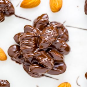 These simple 2-Ingredient Chocolate Almond Clusters are easy, adaptable, and make great gifts!