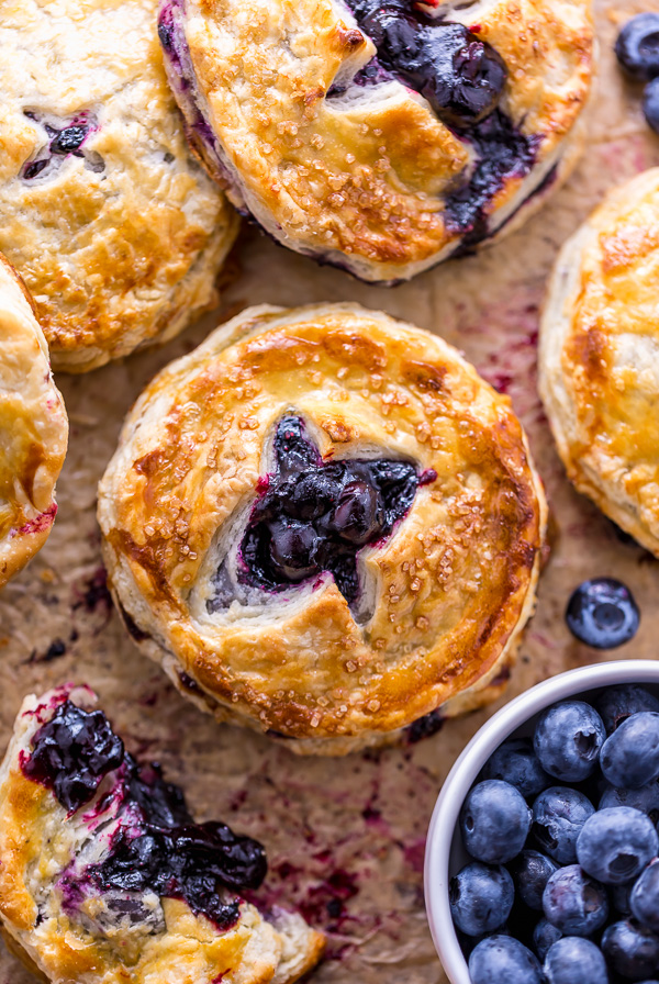 Blueberry pie on parchment paper.