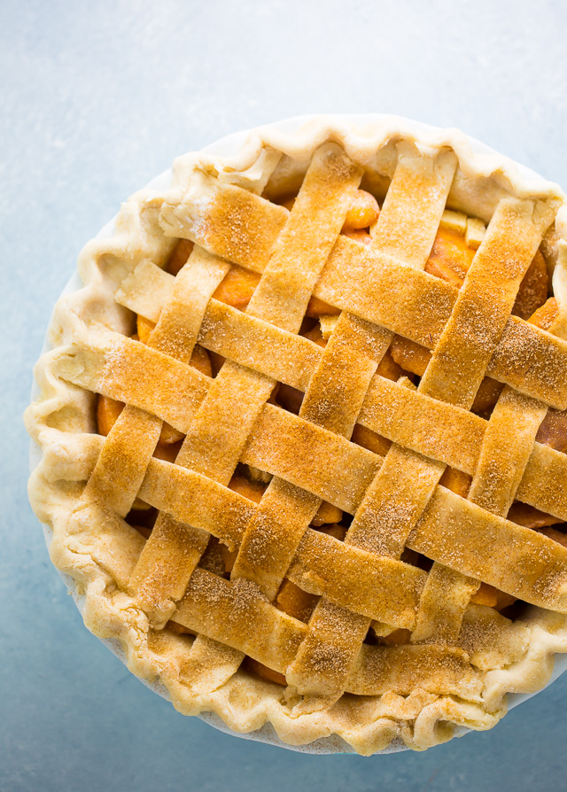 Lattice crust sprinkled with cinnamon sugar. 