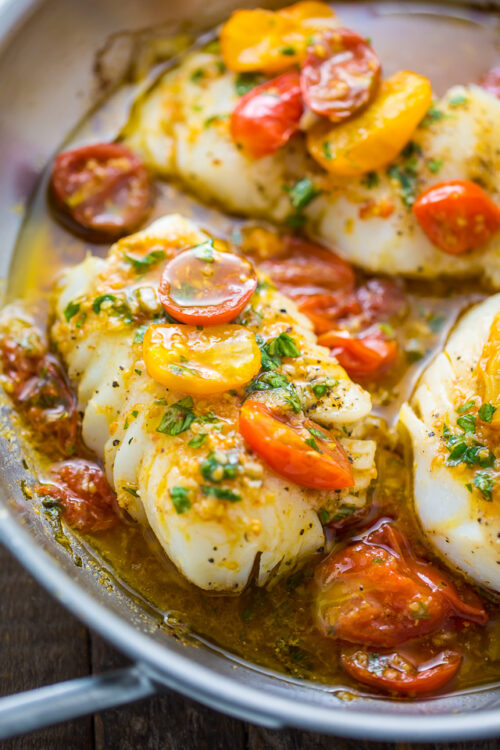A quick and easy recipe for Pan-Seared Cod in White Wine Tomato Basil Sauce!