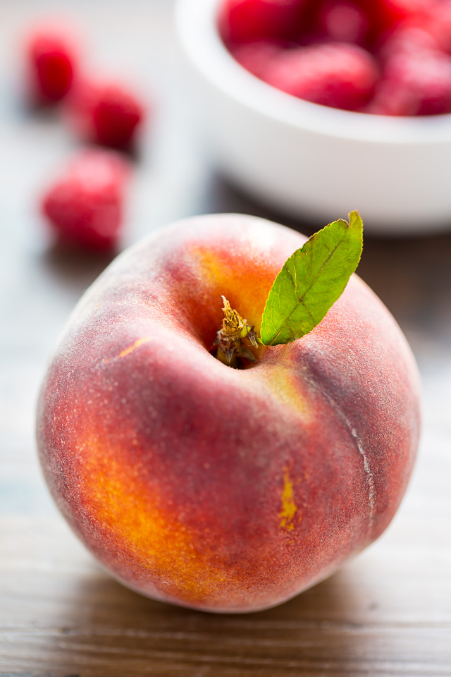 Sweet and fruity Raspberry Peach Muffins! My favorite Summer breakfast!