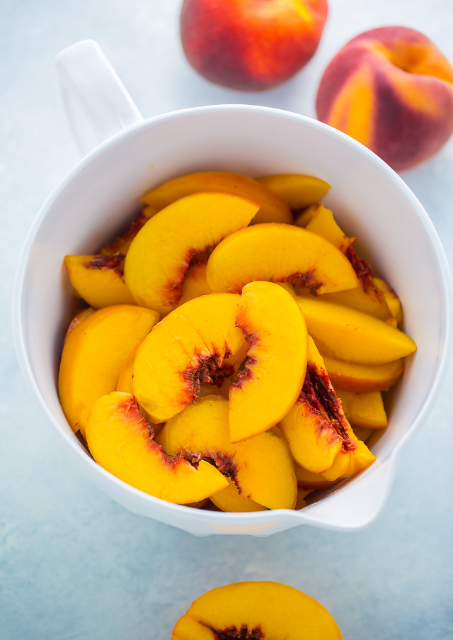 Sliced peaches for peach pie filling.