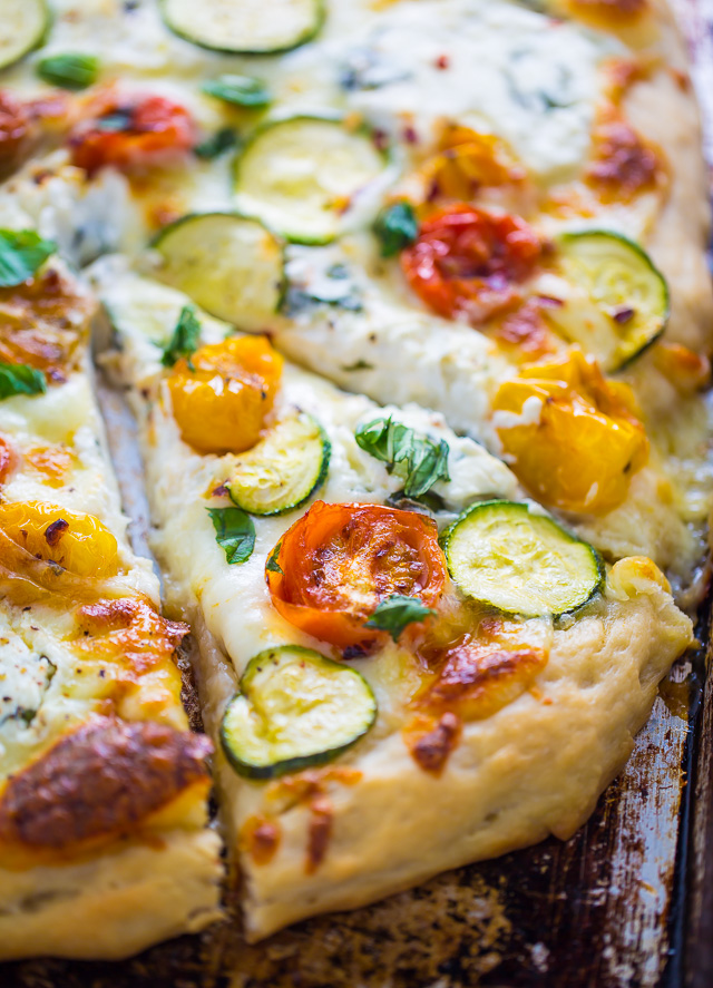 My favorite White Pizza with tomatoes, basil, and zucchini! AKA the PERFECT Summer meal.