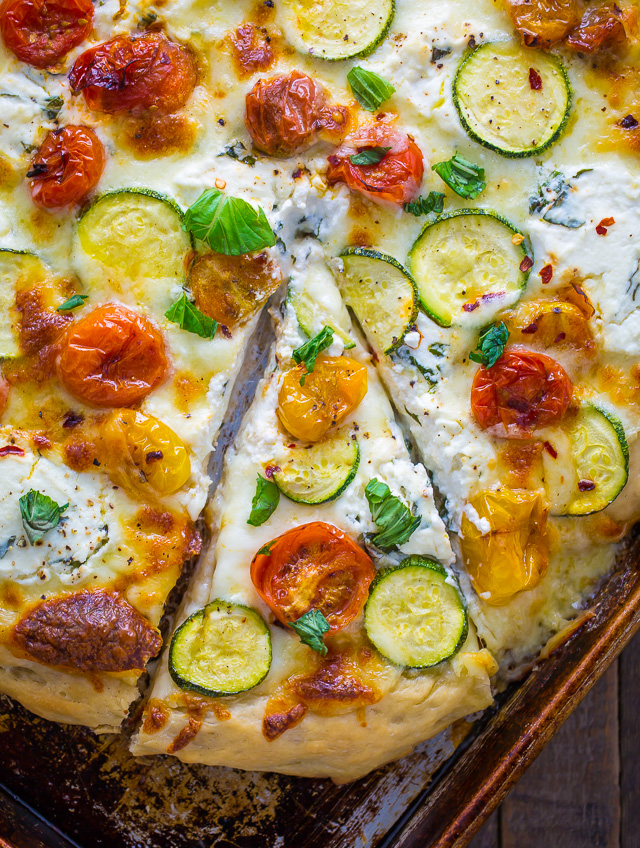 My favorite White Pizza with tomatoes, basil, and zucchini! AKA the PERFECT Summer meal.