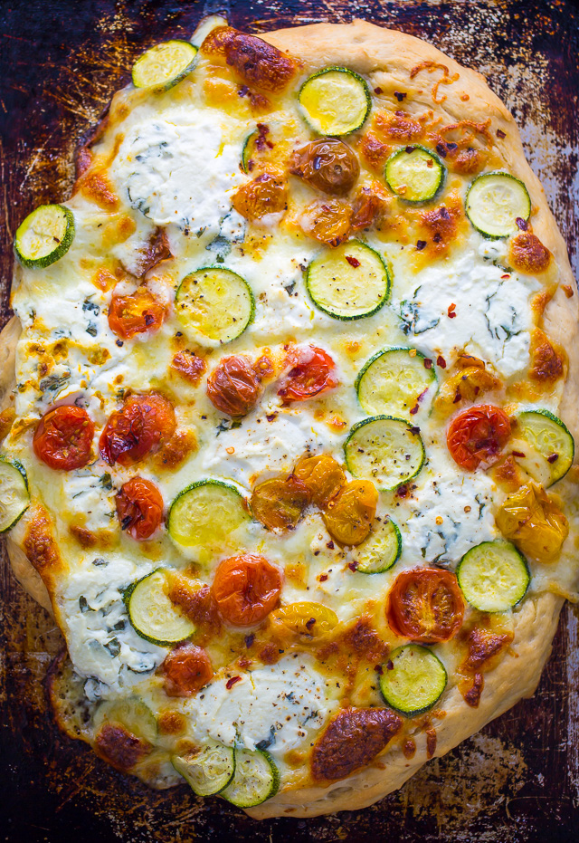 My favorite White Pizza with tomatoes, basil, and zucchini! AKA the PERFECT Summer meal.