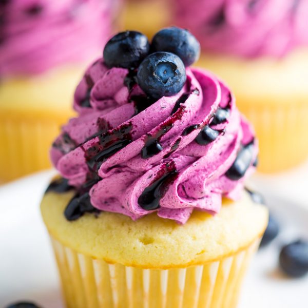 Lemon Cupcakes with Fresh Blueberry Buttercream - Baker by Nature