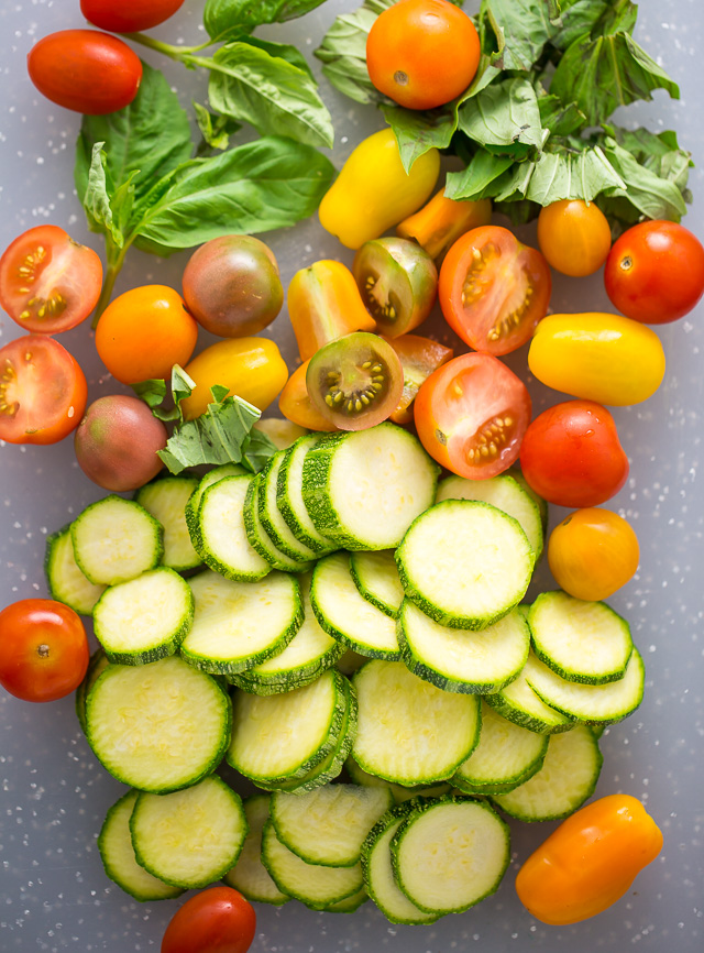 My favorite White Pizza with tomatoes, basil, and zucchini! AKA the PERFECT Summer meal.