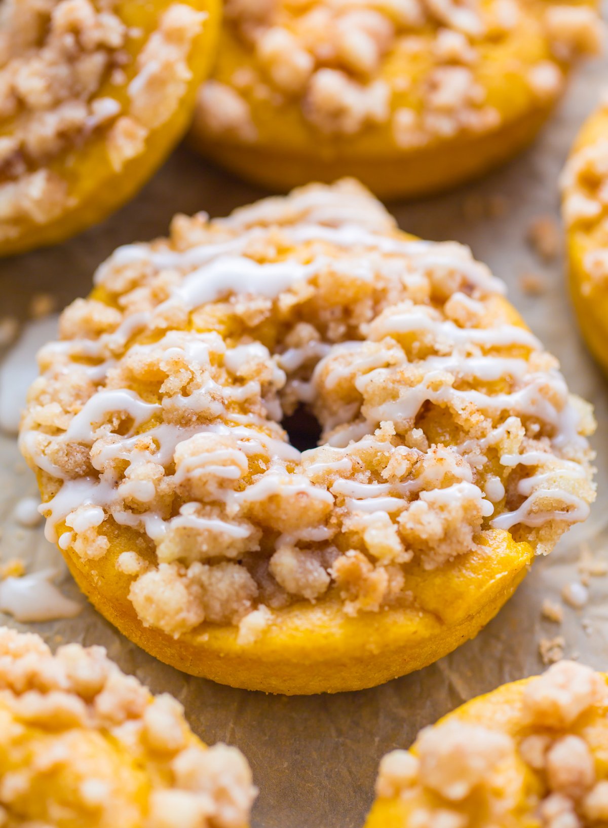 Pumpkin Coffee Cake Donuts are the ultimate breakfast treat! Baked, not fried, and ready in less than 30 minutes.
