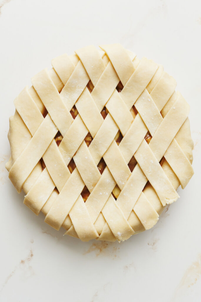 Top crust for apple pie in pie plate.