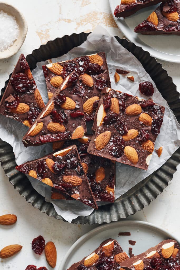 Homemade chocolate bark on a large plate.