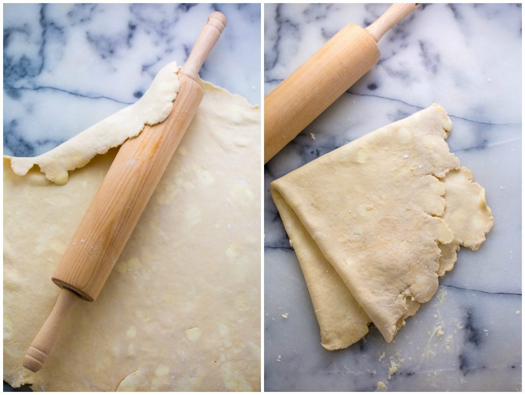 Pie dough rolled out with rolling pin.