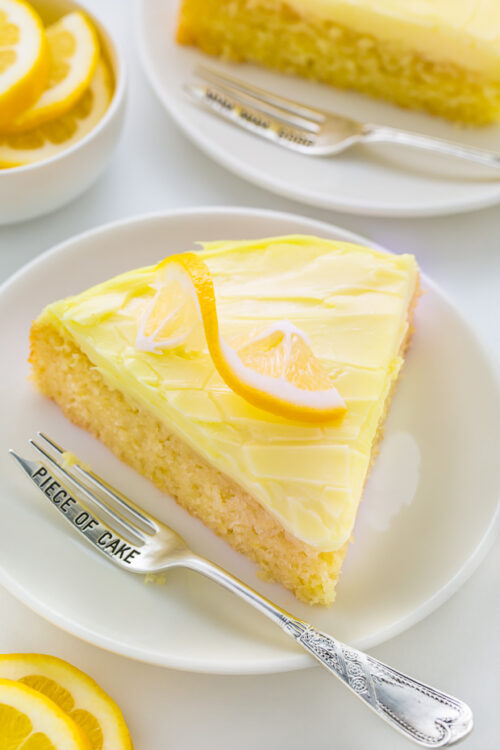 Moist and supremely flavorful Lemon Cake with Lemon Cream Cheese Frosting! SO GOOD.