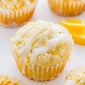 Supremely moist Lemon Crumb Muffins topped with sticky Lemon Glaze!